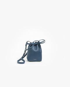 Mini Mini Calf Coated Bucket Bag in Blue by Mansur Gavriel at Mohawk General Store - 1