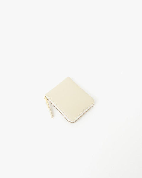 Small Zip Wallet in Cream by Comme des Garçons at Mohawk General Store - 1