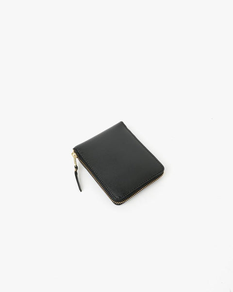 Small Zip Wallet in Black by Comme des Garçons at Mohawk General Store - 1