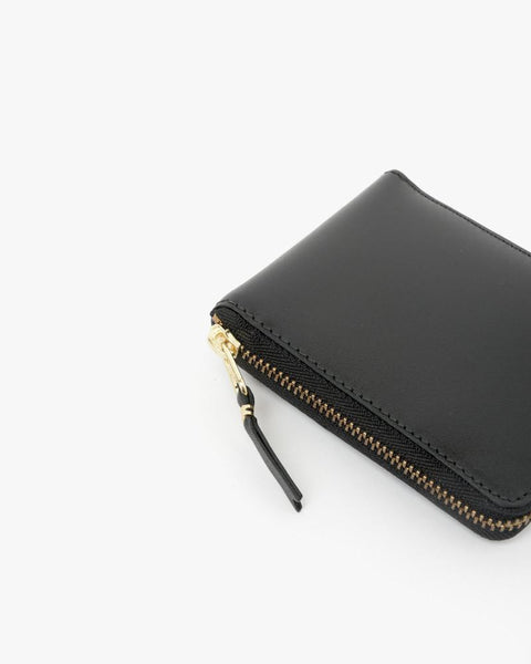 Small Zip Wallet in Black by Comme des Garçons at Mohawk General Store - 2