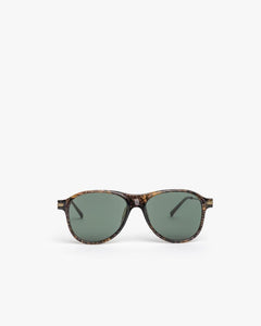 Sunglasses in Dark Horn/Brass/Solid Green by Dries Van Noten x Linda Farrow at Mohawk General Store